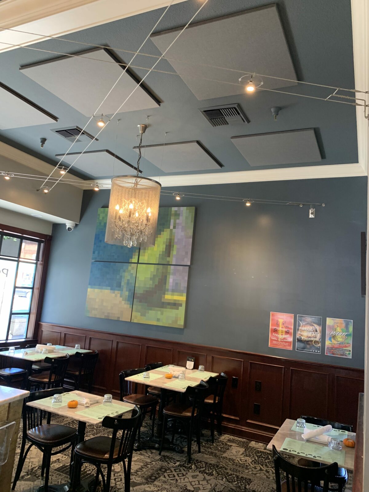 ceiling sound panels control acoustics in a restaurant